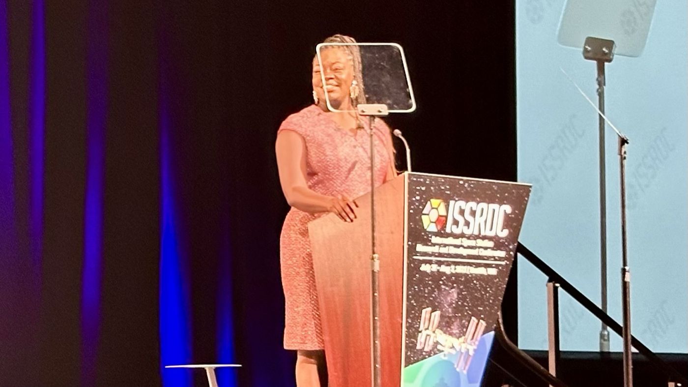 Dr. Raven Baxter speaking at ISSRDC